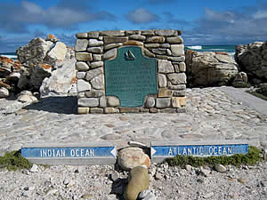 Cape Agulhas (Cape of Needles) is the southernmost point of the continent of Africa and is also the official   dividing point between the Atlantic and Indian oceans although the actual division varies acording to the   fluctuations of the Benguela and Agulhas currents.  Find Agulhas accommodation on our Agulhas accommodation page.