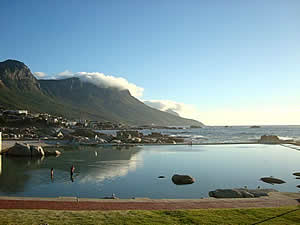 The tidal pool at Camps Bay where you can swim and enjoy the view.  Find Camps Bay Capetown accommodation with its beaches and sunshine on our Camps Bay Cape Town accommodation page.